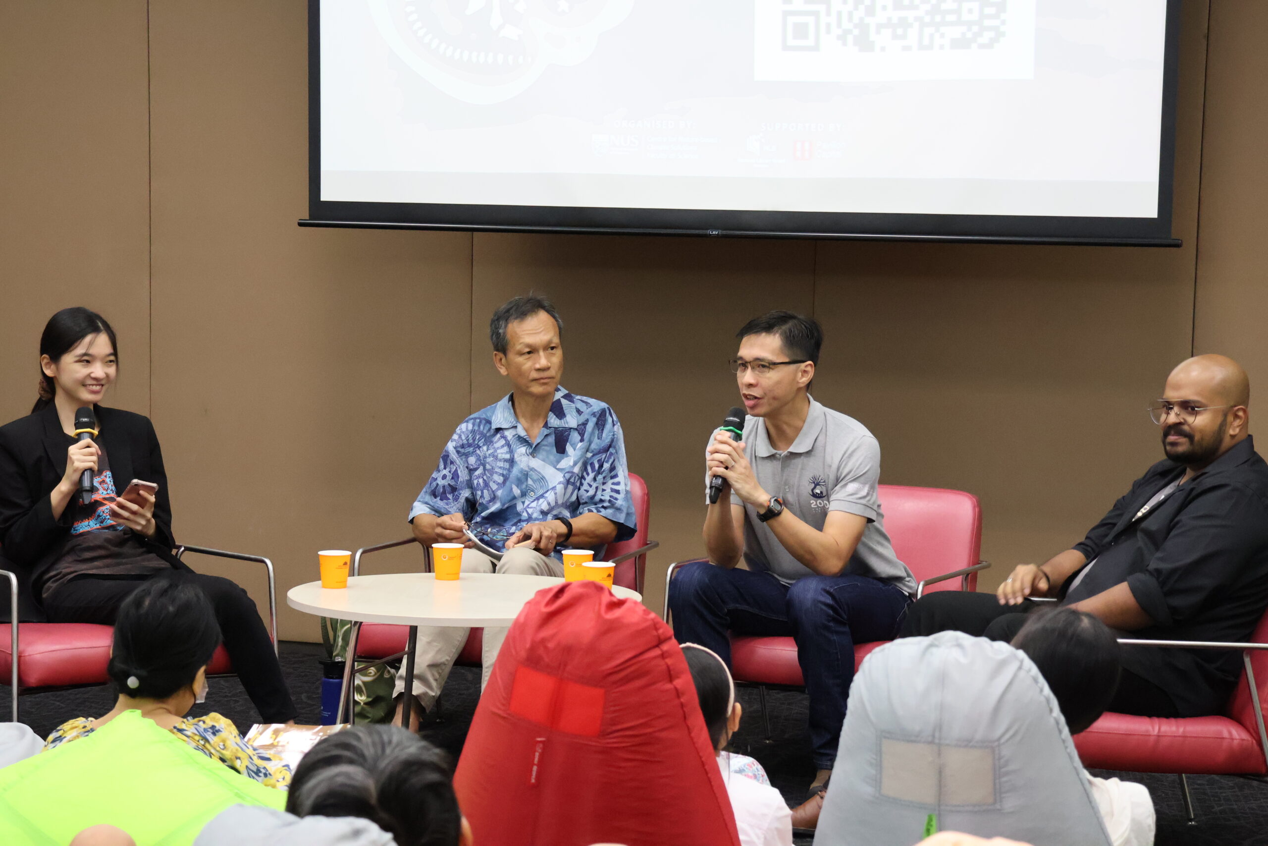 (From left) Miss Annabel Lim, Dr Shawn Lum, Associate Professor Darren Yeo, Mr Kannan Raja, at a panel discussion after the screening of Jurassic Park.

