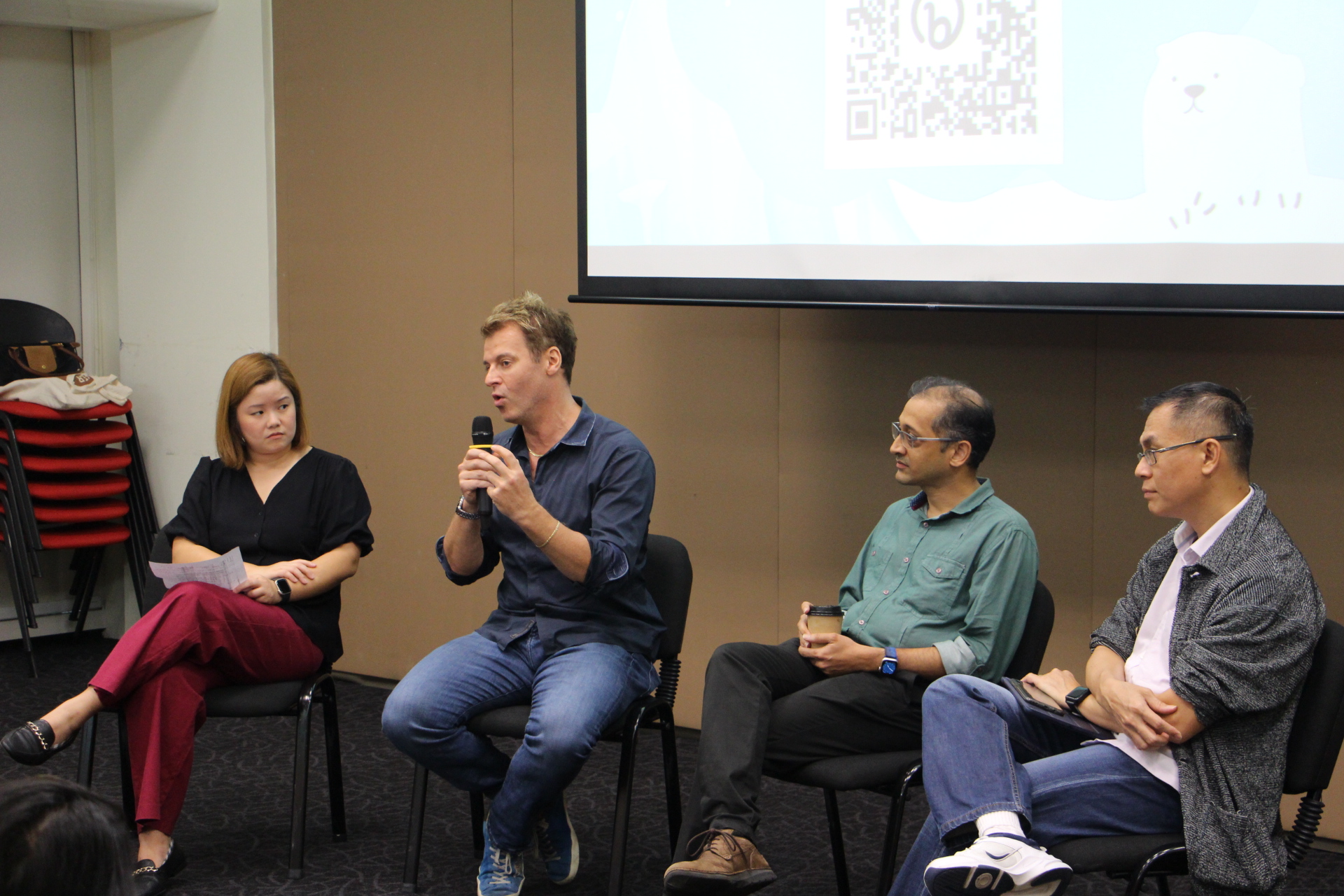 (From left) Ms Melissa Low, Professor Benjamin Horton, Dr Mandar Chitre and Mr Ho Chai Teck at a panel discussion after the screening of The Day After Tomorrow.
